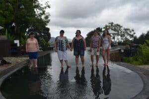 The ladies of the group 'walking on water' on the infinity pool at Strawberry Hills